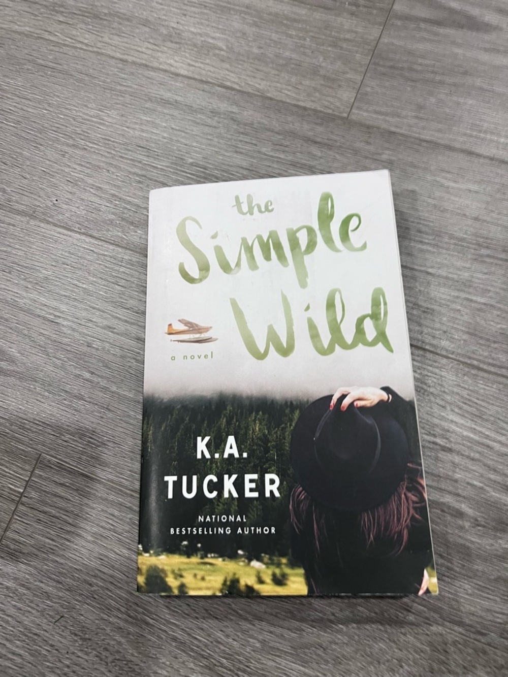 The Simple Wild by K.A. Tucker - White & Green Paperback Novel